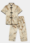 Traditionally styled pyjamas with Chinese features of mandarin collar and flower and knot frog fastenings. Manufactured in a classic gold silky rayon/polyester with a bird of paradise and Chinese lantern print - a symbol of joy and good fortune. Pyjama top has short sleeves, contrast bound mandarin collar and centre front opening which closes with flower and knot frog fastenings. Elasticated waist pyjama bottoms with contrast piped hem cuffs
