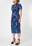 The Cheongsam or Qipao, is a feminine body-hugging dress with distinctive Chinese features of mandarin collar, side splits and hand stitched flower and knot frog fastenings. Manufactured in authentic high quality silk/rayon brocade in a rich blue dragon and phoenix design - a symbol success and prosperity